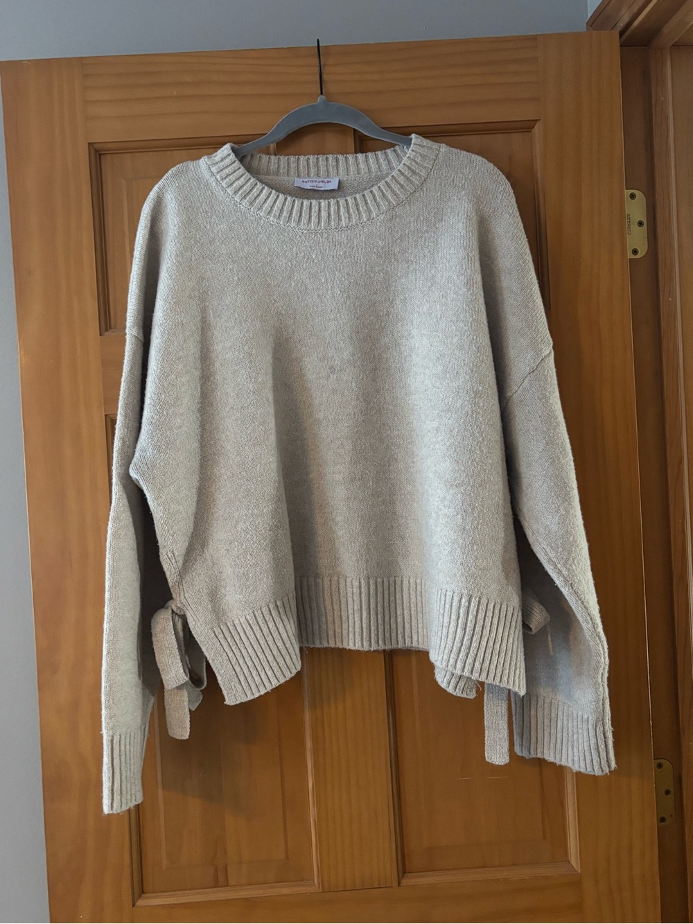 Side-Tie Crewneck Sweater in Cream